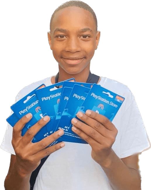 Boy Smiling And Holding Gift Cards