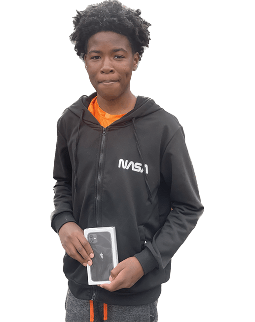 Boy Smiling And Holding New Phone