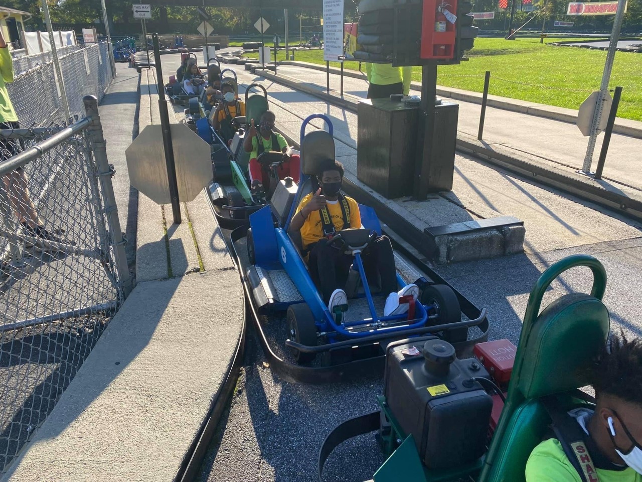 Teeanagers Riding The Go Cart